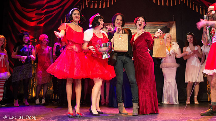 charity lottery  at the Santa & his girls edition of the International Burlsque Circus
